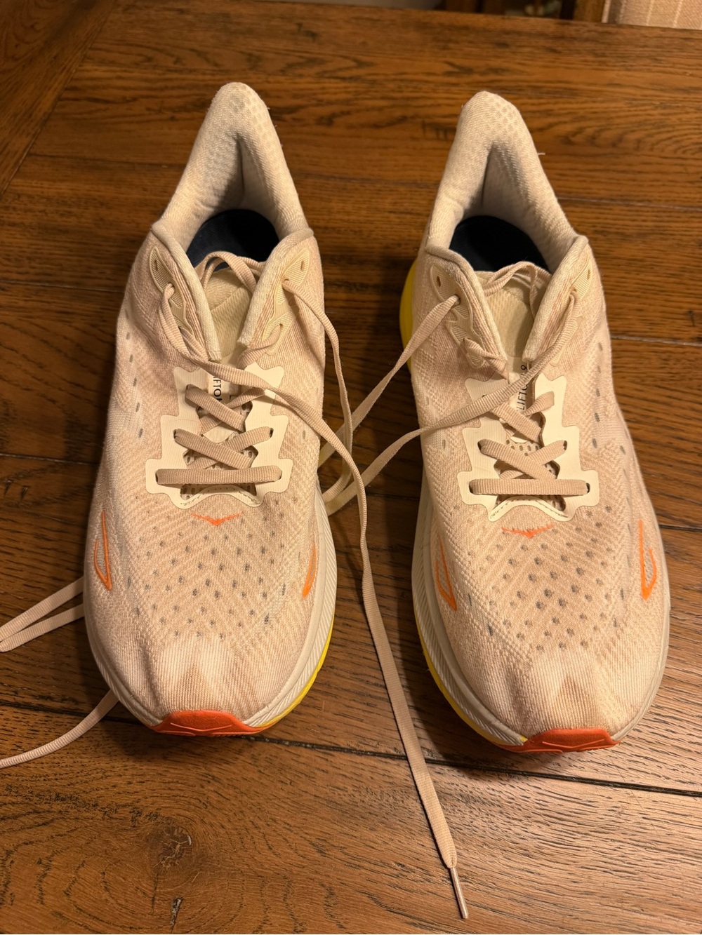 Hoka Men's Running Sneakers in Cream with Orange and Yellow Accents